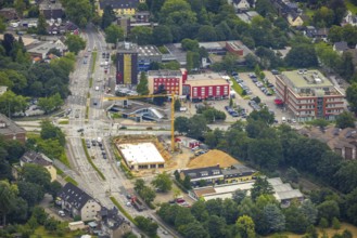 Aerial view, construction site and new building at the intersection of Sittardsberger Allee and