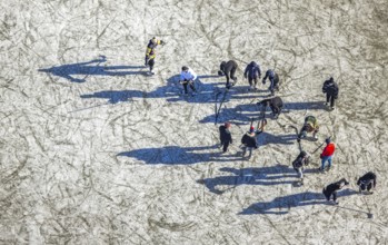 Aerial view, frozen Rhine meadow Ehingen, ice hockey players, Mündelheim, Duisburg, Ruhr area,