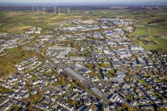 Aerial view, industrial area Brilon with Egger Holzwerkstoffe GmbH and wind farm in the background