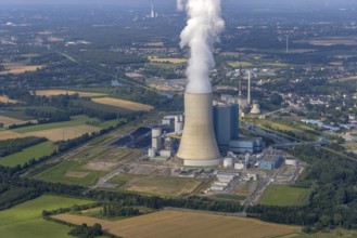 Aerial view of the power plant facilities and exhaust gas towers of the coal-fired power plant