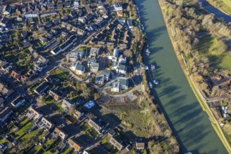 Aerial view of a construction site and new construction of residential buildings with barrier-free