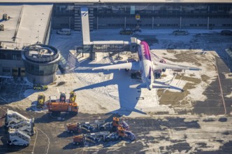 Aerial photo, Dortmund airport in winter, aeroplane, Wickede, Dortmund, Ruhr area, North