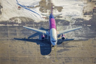 Aerial photo, Dortmund airport in winter, de-iced aircraft, Wickede, Dortmund, Ruhr area, North