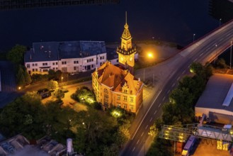 Aerial view, night view of Dortmund harbour, historic building old harbour office, coal port of the