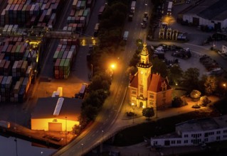 Aerial view, night view of Dortmund harbour, historic building old harbour office, coal port of the