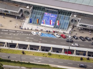 Aerial photo, Dortmund airport, departure level, arrival right of way, flags at airport entrance,