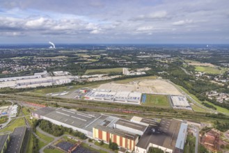 Aerial view, construction site with the new REWE logistics centre on Walzwerkstraße at the old