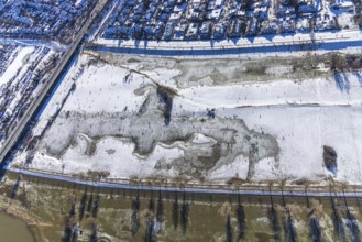 Aerial view, ice rink, ice skaters and pedestrians on frozen Rhine meadow in Lörrick near the