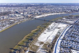 Aerial view, ice rink, ice skaters and pedestrians on frozen Rhine meadow in Lörrick near the