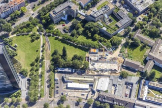 Aerial view, construction site and new construction of an apartment building on Löbbeckestraße in