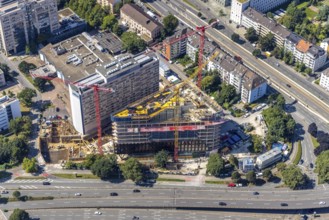 Aerial view, construction site and new construction of the three-storey Eclipse high-rise building