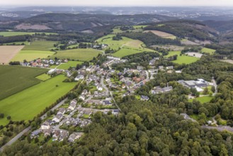 Aerial view, hilly landscape and local view with specialised hospital Homborn and short-term home
