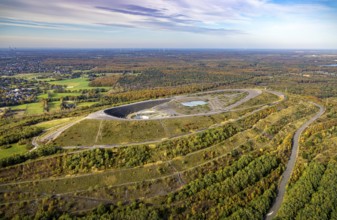 Aerial view, Haniel spoil tip and autumn forest in the Fuhlenbrock district of Bottrop, Ruhr area,