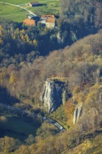 Aerial view, Reckenhöhle dripstone cave in the autumnal forest in the district Volkringhausen in