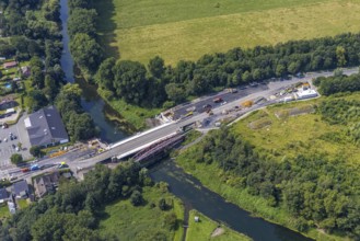 Aerial view, construction site and new construction of a bridge on Werner Straße over the river