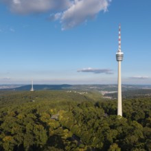 High television tower above lush greenery, soft clouds in the clear sky, Stuttgart-Degerloch,