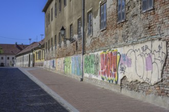 Dilapidated house with graffiti in the old town centre of Tvrda, Osijek, Osijek-Baranja County,
