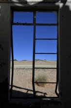 View from the window of the old German railway station of Garub into the Namib Desert, near Aus,