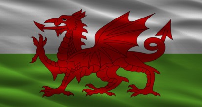 Wales flag with fabric texture. Realistic flag of Wales waving
