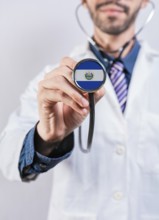 El Salvador health and medical insurance concept. El Salvador healthcare system, doctor holding