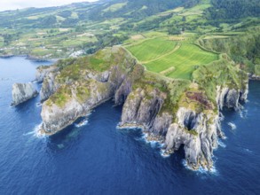 Cape Furado, Rocky Cliffs, Green Lush Fields, Pasturelands, Hills and Atlantic Ocean. Azores, Sao