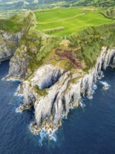 Cape Furado, Rocky Cliffs, Green Lush Fields, Pasturelands and Atlantic Ocean. Azores, Sao Miguel