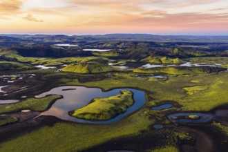 Moss-covered landscape and lakes in the Icelandic Highlands, Iceland