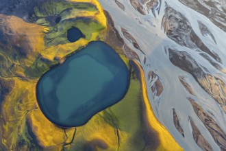 Turquoise crater lake and glacial river, Icelandic Highlands, Iceland