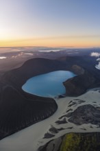 Turquoise crater lake Skyggnisvatn and glacial river, Icelandic Highlands, Iceland
