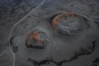 Red craters in black sand desert, Icelandic Highlands, Iceland