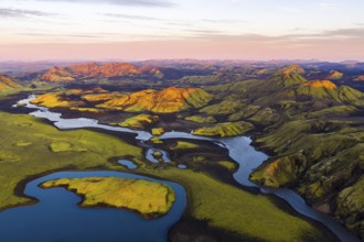 Mossy landscape and lakes at sunrise, Icelandic Highlands, Iceland