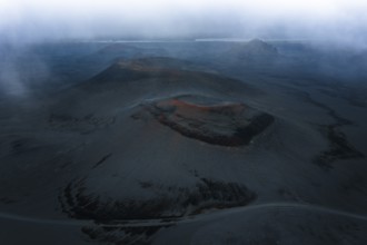 Red craters in black sand desert, Icelandic Highlands, Iceland
