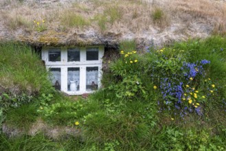Windows and decoration of a traditional house with grass roof, Bakkagerdi, East Iceland, Iceland