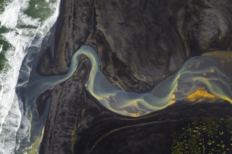 Interwoven river with colourful sediments, South Iceland, Iceland