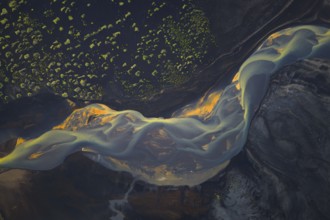 Interwoven river with colourful sediments, South Iceland, Iceland