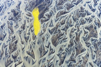 Small island in the branched course of a glacial river, South Iceland, Iceland