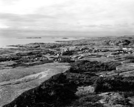 Rocky landscape in the Ramsvikslandet nature reserve, the sea in the background, black and white,