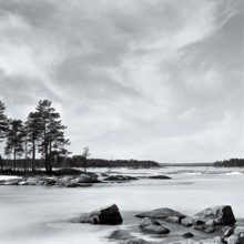 Lake Stora Gla in winter, frozen, with rocks and islands, black and white, analogue, Värmland,