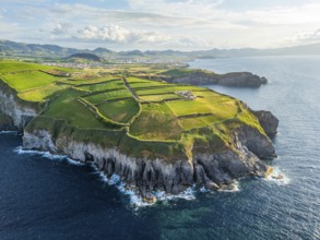 Cape Cintrao, Cliffs, Green Hills, Fields and Atlantic Ocean. Azores, Sao Miguel Island. Portugal.