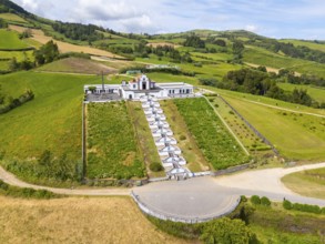 Church Nossa Senhora da Paz and Green Hills. Azores, Sao Miguel Island. Portugal. Aerial View
