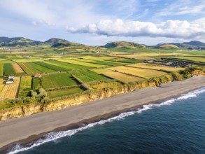 Areal de Santa Barbara Beach, Green Lush Fields and Atlantic Ocean. Azores, Sao Miguel Island.