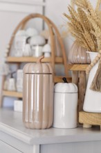 Boho autumn home decor with ceramic pumpkin jars