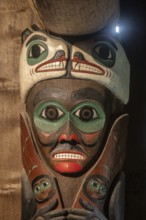 Totem poles in a Tlingit Clan House, Totem Bight State Historical Park, Ketchikan, Alaska, USA
