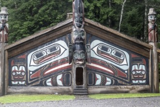 Totem poles at a Tlingit Clan House, Totem Bight State Historical Park, Ketchikan, Alaska, USA