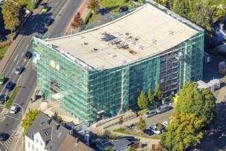 Aerial view, Hamm Municipal Music School, covered building and construction site with new building,