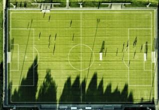 Aerial view, Sportzemtrum Ost Hammer SpVg 03/04 e.V., training games and shadow cast by the evening