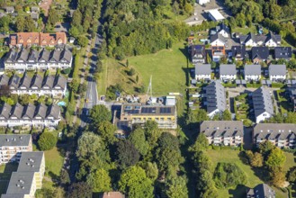 Aerial view, construction site with new building day care centre Villa Kunterbunt at
