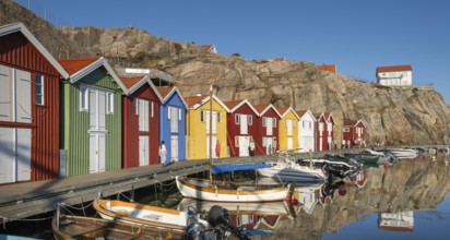 Boats and colourful boathouses in the harbour of Smögen, Smögenbryggan, Västra Götalands Län,