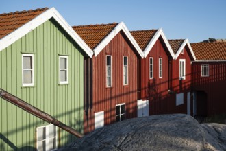 Colourful boathouses in the harbour of Smögen, Smögenbryggan, Västra Götalands Län, Bohuslän,