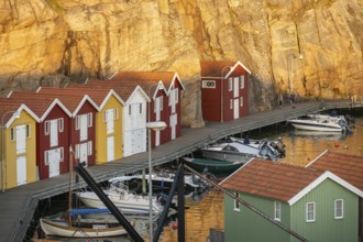 Colourful boathouses and boats in the harbour of Smögen, evening mood, Smögenbryggan, Västra